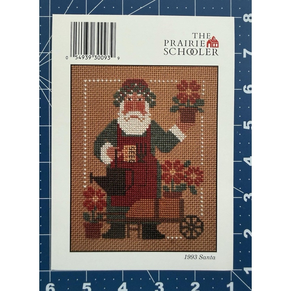 The Prairie Schooler Cross Stitch Card 1993 Poinsettias Watercan Gardener Santa